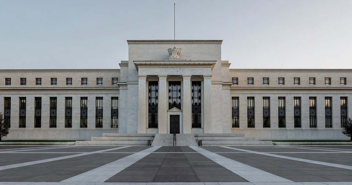 The neoclassical facade of the Federal Reserve headquarters building in Washington under soft morning light with a quiet empty plaza